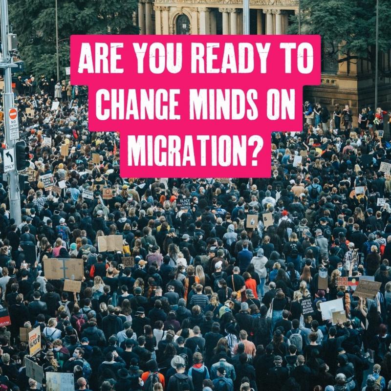 A large protest crowd with banners. At the top pink text reads 'Are you ready to change minds on migration?'